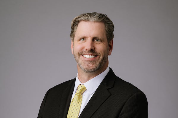 A photo of MassHousing Chief Legal and Operating Officer Colin McNiece